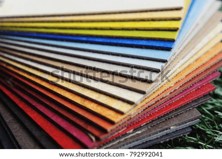 Top samples of various color palette - wooden floor timelapse stop motion.