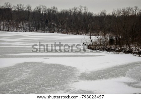 frozen lake stark black and white photograph