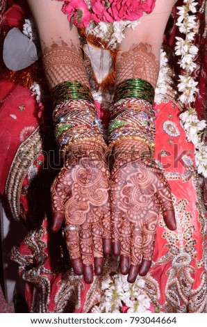 decorated bride hands with henna