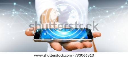 Businessman on blurred background using planet earth network with mobile phone 3D rendering