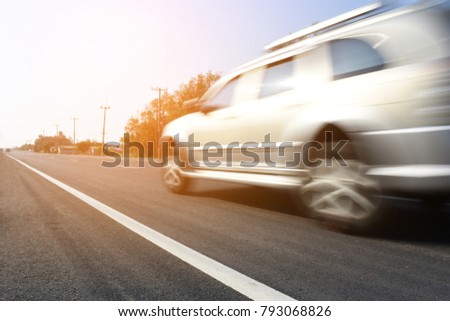 Cars are driven on high speed roads. The road stretches forward. There is space and lines of sight.