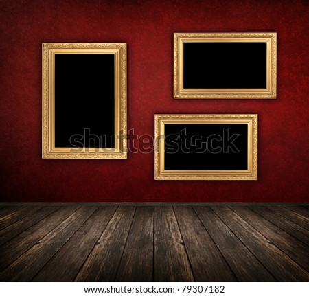 vintage red interior with empty frame hanging on the wall