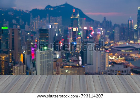 Opening wooden floor, Hong Kong blurred light business downtown, abstract background
