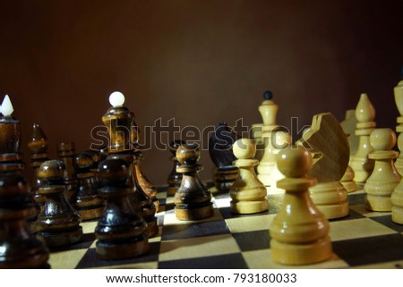 Chess game. Wooden chess pieces on a chessboard
