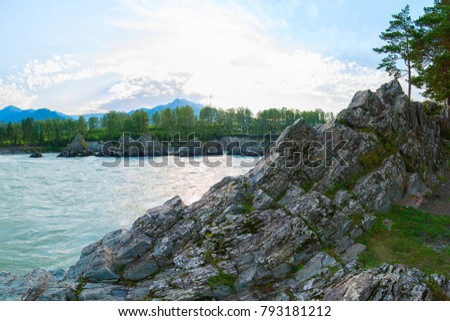Fast mountain river Katun in Altay, Siberia, Russia. A popular tourist place called the Dragon's Teeth