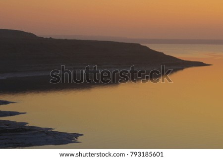 Sunset on the Dead Sea rocky mountains