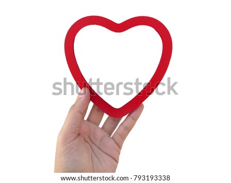 Man holding red heart wooden frame isolated background
