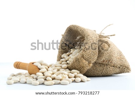 white beans on a sack vegetarian food  on white