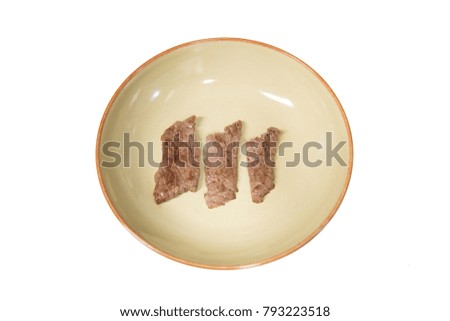 Beef in a round plate