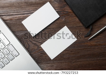 White empty business card mockup wood table. Modern Notebook clean object information. Mock Up