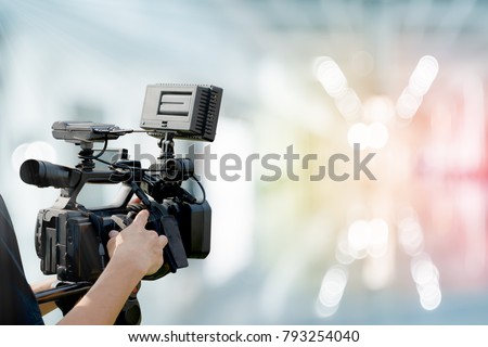 Video camera with abstract blurred background, idea concept for video professional business. Royalty-Free Stock Photo #793254040