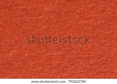 Orange paper texture background, close up. High resolution photo.