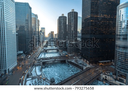 Chicago downtown buildings and river in winter