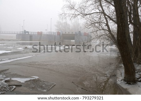 Hydropower station in fog