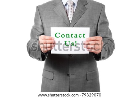 A business man holding card Contact Us - isolated on white background