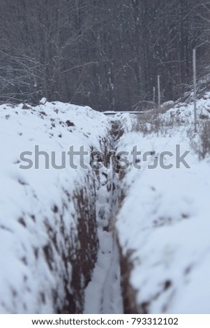 Trench, ditch. Pipeline. Winter