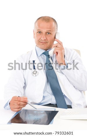 Hospital professional doctor male with stethoscope on phone hold x-ray