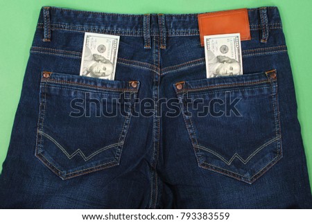 Cash, money is in the pocket of blue jeans. Close up