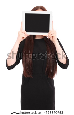 Girl keeps tablet pc the face isolated on white