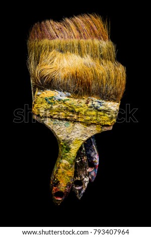 Colored multicolor old paint brush of the black background