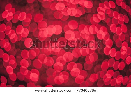 Blurred red background.