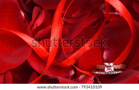 Roses petals with ring