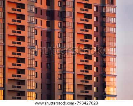 High modern building at sunset
