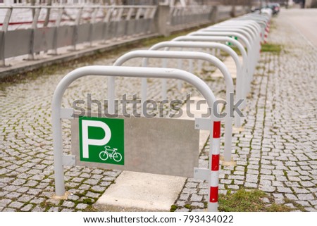 Parking site for bicycles on a cloudy day, Vienna Austria