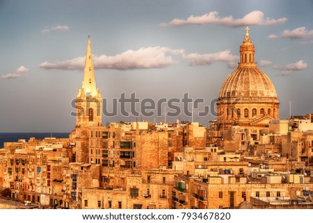 Valletta, Malta: aerial view from city walls at sunset. The cathedral