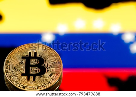 coins Bitcoin, amid Colombia flag, concept of virtual money, close-up. Conceptual image of digital crypto currency.