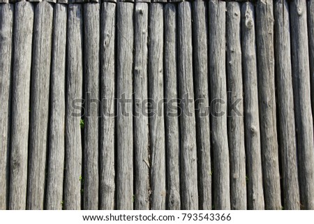 texture from big old grey and wooden logs