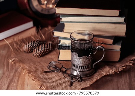 Old books and tea in the evening.