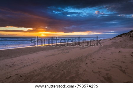 afternoon last light sunset windswept Venus bay beach southern ocean waves windswept stormy sky