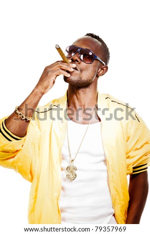 Studio portrait of cool black gangster rapper with yellow jacket, sunglasses and cigar. Isolated on white background.