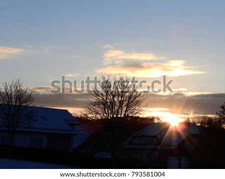 Sunrise behind a Roof with Snow, Giengen/Brenz, Germany, Europe