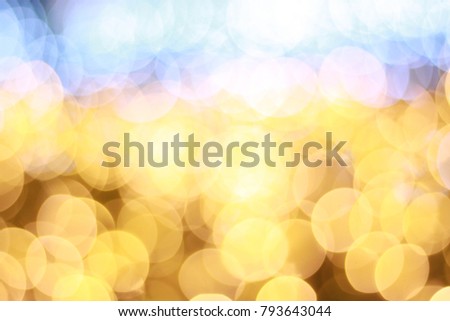 Abstract elegant glitter sparkle bokeh defocused on color background