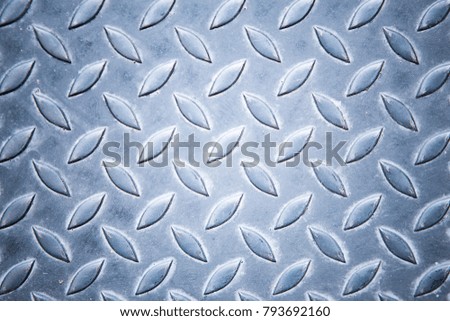 Old rusty blue diamond metal plate texture pattern used as abstract background