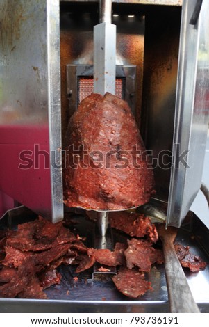 making Kebab sandwiches on fast food street restaurant