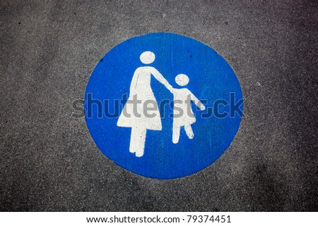 Pedestrian sign painted on a road