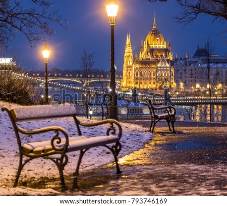 Budapest, Hungary - Snowy winter night Hungarian Parliament, Chain bridge 