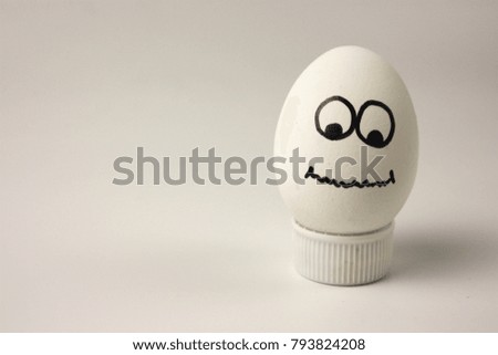 peace concept. A cute and funny egg with painted face and hair. photo for your design