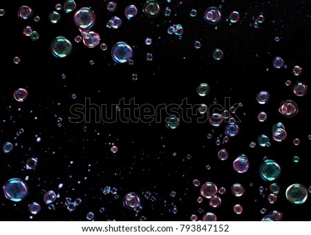 Bubbles on black background Royalty-Free Stock Photo #793847152