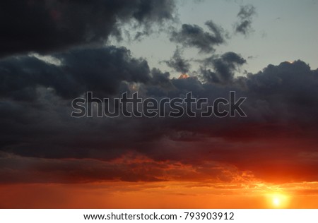 Colorful sky sunset time before sunset. warm picture with clouds for advertising background, colorful postcard 