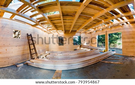 Panoramiv view of wooden roof construction, symbolic photo for home, house building, and house financing