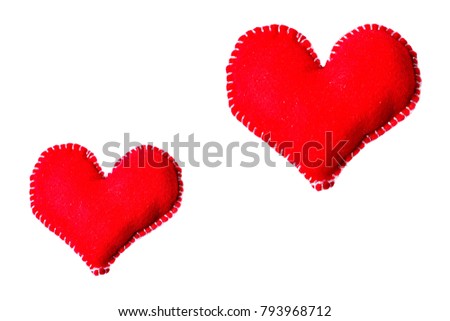 The two shiny red fabric hearts, small one on the left bottom and bigger one on the right top and free space for texts isolated on white background.Concept Valentine's day and love forever or wedding.