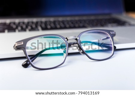 
Office desk, glasses and computer working scene
