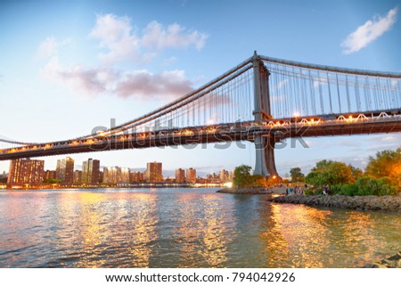 Brooklyn Bridge Park at sunset with Manhattan Bridge.