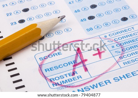 Close-up photograph of a perfect grade on a scantron test. Royalty-Free Stock Photo #79404877