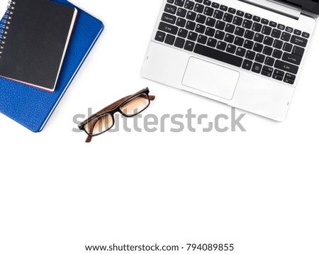Minimal and Modern white desk and table office with laptop and glasses and other supplies, Top view with space for copy paste your  text, Concept Minimal and Modern background