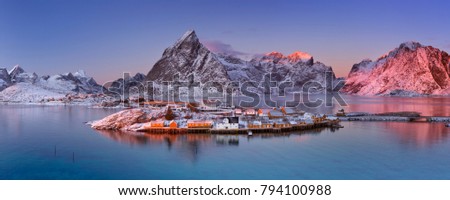 The village of Reine on the Lofoten in northern Norway. Photographed at dusk in winter.